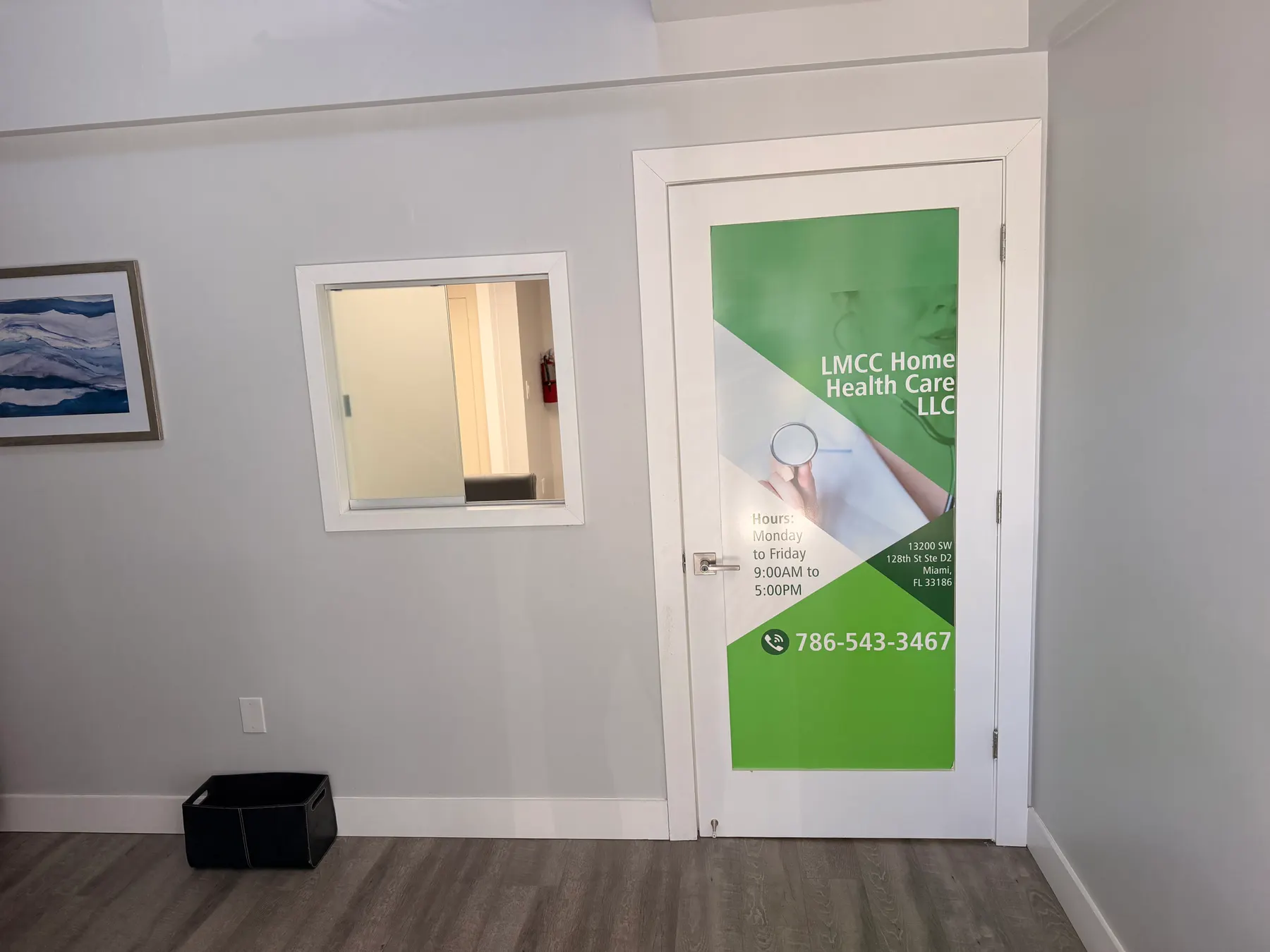 The LMCC branded office door in Miami